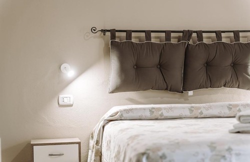 Carbonia Apartment | La foresteria di Mony e Ale