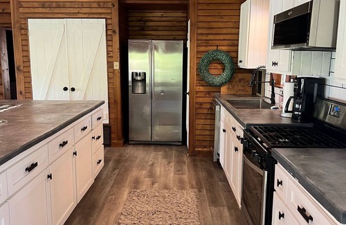 Nocona Cabin | Lakefront 3 bedroom/2 bath Log Cabin with Dock, Deck & Amazing Sunset Views!