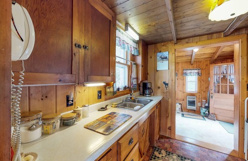 Greenville House | Lakefront cabin with private boat ramp, lake access, wrap-around porch, firepit