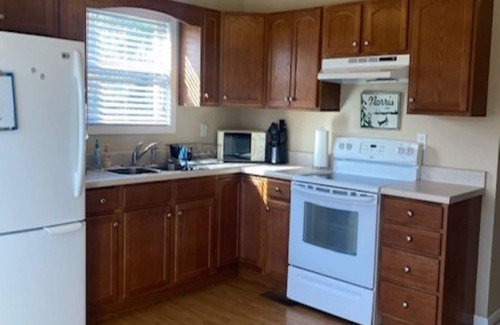 Jacksboro Cottage | Lakefront Cabin in quiet cove. No steps to private boat slip. Pet friendly.