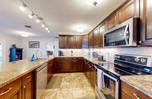 Pulaski House | Lakefront home with lake views, kids game room, docks, deck, grill, kayaks, W/D