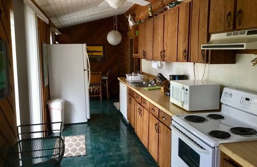 Hawthorne House | Lakefront Log Home, Screened Heated Pool, & Recreation House