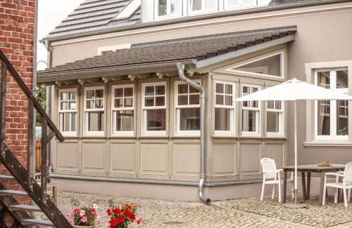 Hintersee Apartment | Landhaus hinter`m See Ferienwohnung Landliebe luxuriöser Wintergarten Kachelöfen