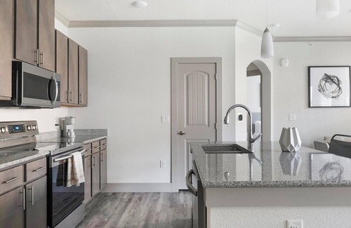 Manor Apartment | Landing at The Flats at Shadowglen - 1 Bedroom .