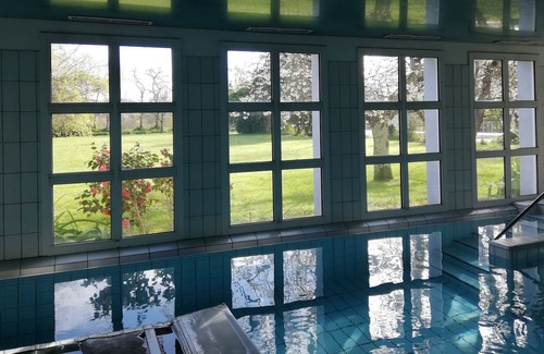 Marciac House | Large cottage **** with heated indoor swimming pool in park in the heart of Marciac