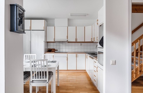 Uppsala House | Large family home beside forest