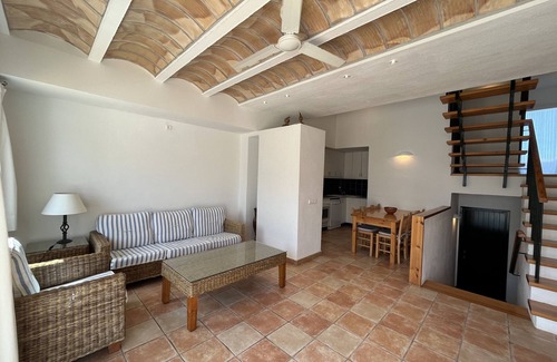 Fornells Ski Chalet | Large house with shared pool near the sea