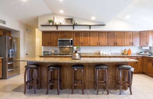 Avondale House | Large oasis, pool heater, spa, putting green