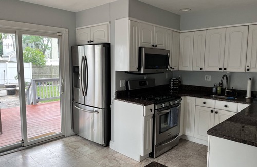 Malden House | Large private home, 15 min to Boston, Parking, Large yard
