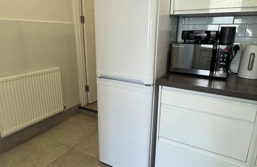 West Ham House | Large room with access to the garden