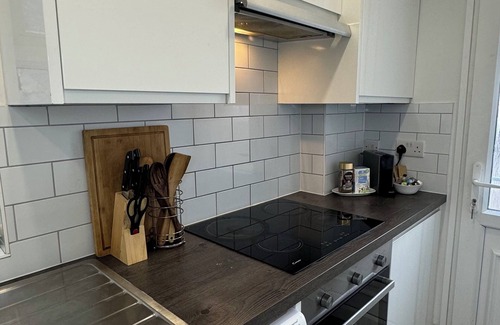 West Ham House | Large room with access to the garden