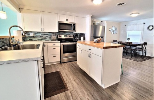 Cedar Point House | Large Waterfront Home with private dock and hottub, 3 miles to Emerald Isle Beach