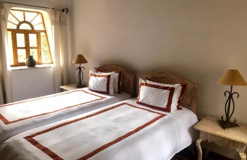 Moccopata Hotel | Las Casitas del Arco Iris