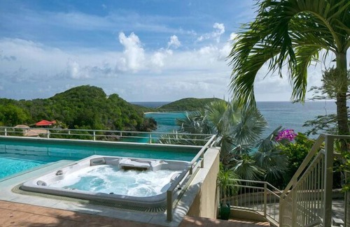 Rendezvous & Ditleff Villa | Latitude 15A: Walk to Klein Bay! Pool & Hot Tub!
