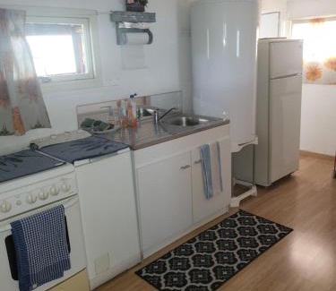 Valeille Apartment | le bungalow au fond du jardin
