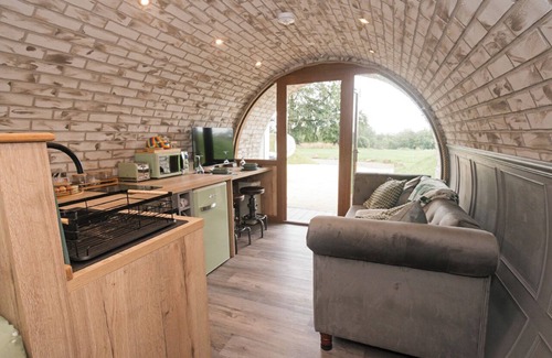 Falkirk Cabin | lily's Pad cabin, built into the side of a hill in the beautiful countryside