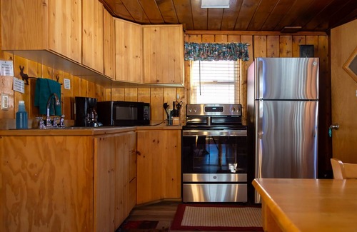 Red River Cabin | Located by the River and facing the mountains