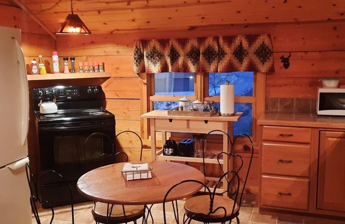 Shell Knob House | Log Cabin with lake view