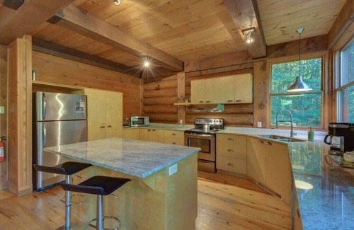 Lac Superieur Village Ski Chalet | Log Cottage Resort Access & Spa
