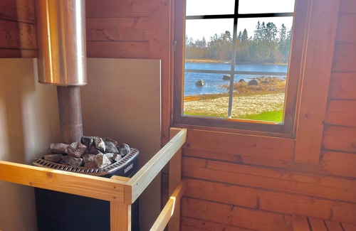 Lorudden Villa | Log house with private beach and own dock incl. boat