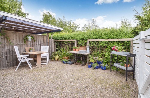 Kongsnæs House | Look forward to a vacation in this child-friendly vacation home with a beautiful fenced garden.