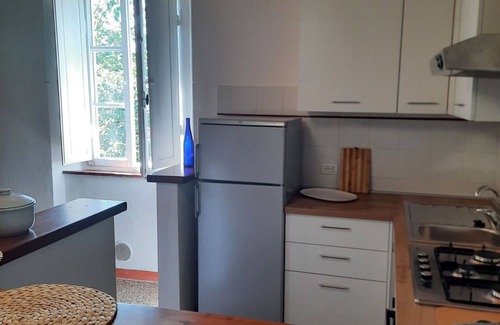 Rosignano Marittimo Villa | Lovely apartment in villa for 10 guests with pool, TV, pets allowed and parking