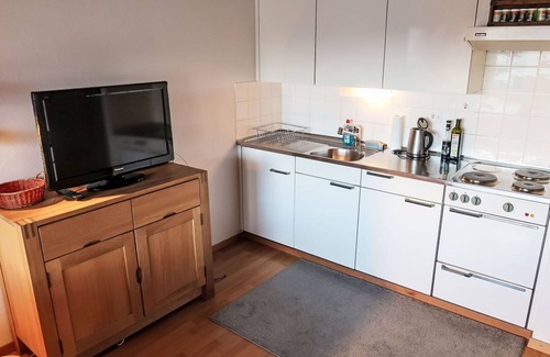 Laax Apartment | Lovely apartment for 3 guests with pool, WIFI, TV, balcony, pets allowed, panoramic view and par.