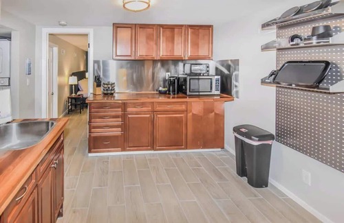 University Hills House | Lovely Lower Unit with Dual King Beds
