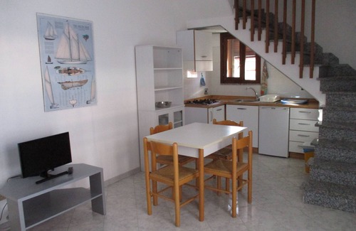 Porto Azzurro Apartment | Lovely one-bedroom apartment with terrace and parking space a few steps from the center