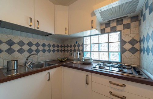 Porto Azzurro Apartment | Lovely one-bedroom apartment with terrace and parking space a few steps from the center