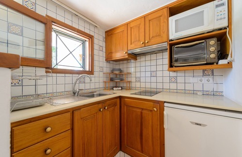 Sant Josep de sa Talaia Villa | Luxurious Villa “Casa Olivo” with Mountain View, Pool, Wi-Fi, Balcony & Air Conditioning