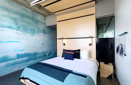 River North Art District Hotel | Luxurious King Room with Breathtaking Mountain Views and Modern Elegance