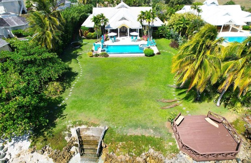 Lowlands Villa | Luxurious Ocean Front Villa with its own private infinity pool & beach!