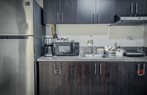 San Antonio Condo | Luxury 2 bedroom condo connected to the mall and MRT, only 4km from the airport!
