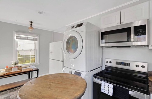 East Raleigh House | Luxury 2BD Home, Coffee, Games, Outdoor Seating, Close to Airport, Hospitals