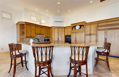 Siesta Isle House | Luxury home boasting waterfront views with pool and golf simulator
