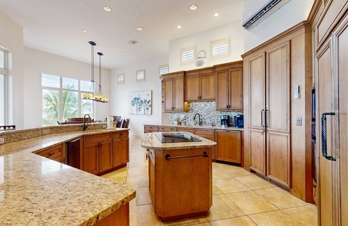 Siesta Isle House | Luxury home boasting waterfront views with pool and golf simulator