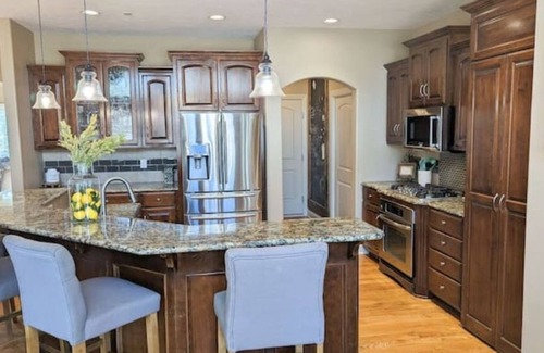 Omaha House | Luxury Home with Heated Saltwater Pool