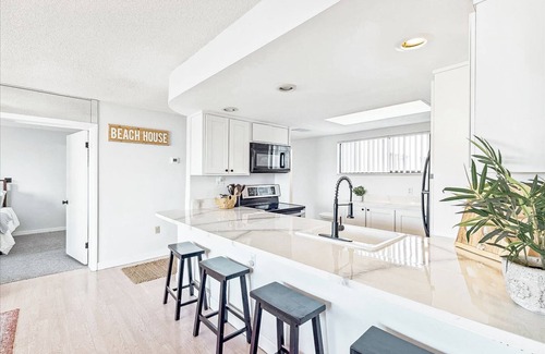 Avon By The Sea Condo | Luxury Oceanfront Getaway on the Top Floor Penthouse Corner Unit Steps from the Beach