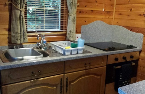 Skelwith Bridge Cabin | Luxury pine log cabin positioned within the mountains of the Lake District