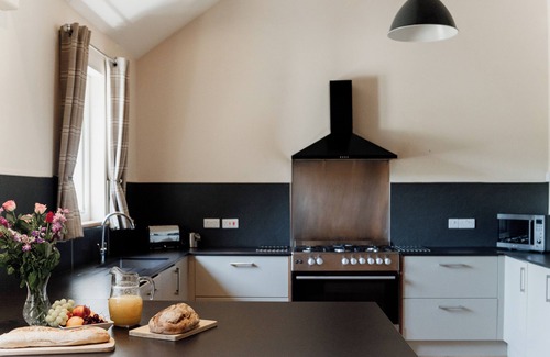 Devils Bridge House | Luxury renovated barn in the countryside with a large hot tub sleeping up to 38. Pets welcome