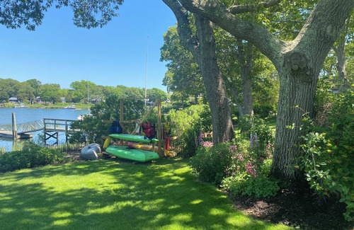 Mattituck House | Luxury waterfront beach house with dock, kayaks canoe, paddle-board and hot tub