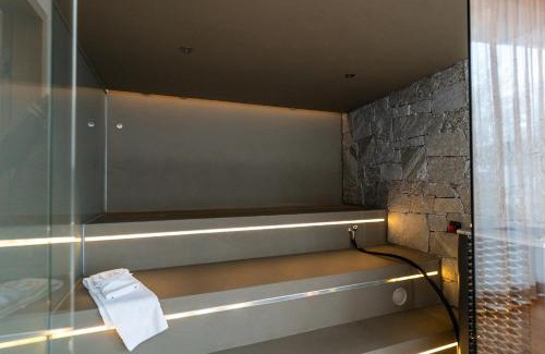 Flims Apartment | Luxus-Mountain-Suite Rocca Bella mit Dampfbad & saisonalem Aussen-Pool