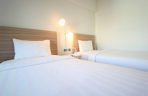 Nuea Mueang Hotel | M Grand Hotel Roiet