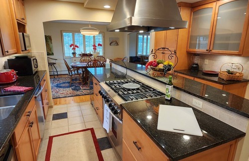 Mount Vernon House | Main floor master, gourmet kitchen, and Hot tub with amazing mountain views