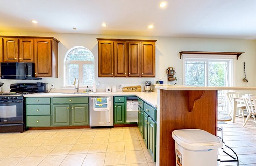 Holden House | Maine Country Getaway | Creekside house in Holden with deck & great location