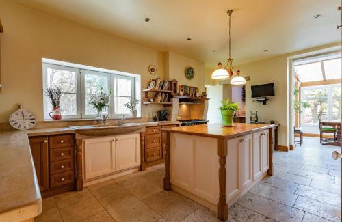 Mezin Villa | Maison de village -8 pers- Piscine chauffée & cuisine d'été en Gascogne