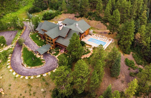 Purgatory House | Majestic Manor with Private Pool, Theater Room, Large outdoor wedding altar