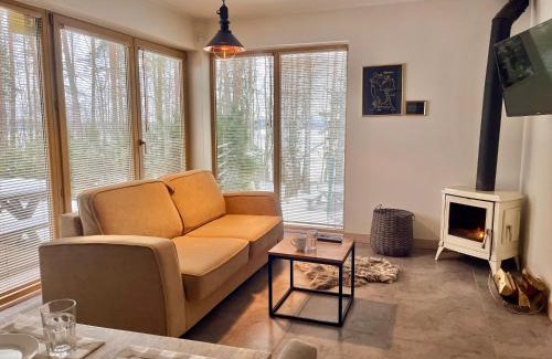 Gledy Apartment | Mazursko - komfortowe apartamenty nad jeziorem, sauna, kominki na parterze