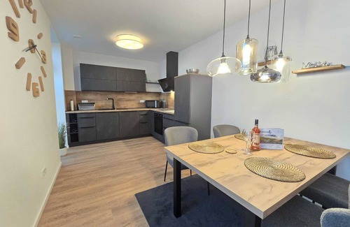 Suderneuland I Apartment | Meeresrauschen - vacation with terrace, sauna & garden at the Norder Marina